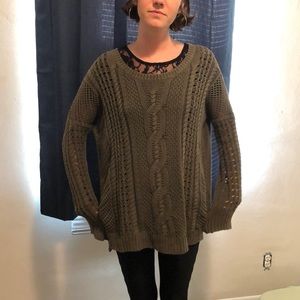 Oversized green knitted sweater